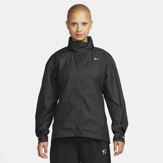 Don't let the rain stop you in this lightweight, water-repellent jacket. With a stowaway hood and curved, elongated back hem for extra coverage, you can feel prepared for changing conditions. Add the vent on the back that helps increase airflow, and you’re ready to push through that extra mile, no matter the weather. Womens Running Jacket, Water Repellent Jacket, Running Nike, Running Jacket, Womens Activewear, Running Women, Black Jacket, Jacket Tops, Water Repellent