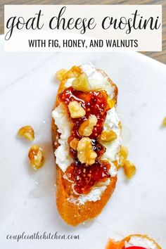 a white plate topped with bread covered in fruit