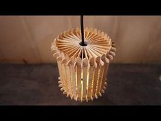 a light that is made out of wood sticks