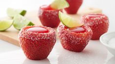 strawberries with limes and sugar on them