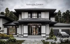 a car is parked in front of a large white and black house with the words alekssand zahavo above it