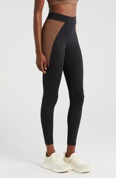 Get active and stay comfy in these colorblocked leggings with an encased elastic waistband and invisible side pocket. Pull-on style Drop-in pockets 80% nylon, 20% spandex Machine wash, tumble dry Imported Functional Nylon Leggings With Contoured Waistband, Nylon Leggings With Contoured Waistband For Gym, Nylon Color Block Activewear Athleisure, Sporty Nylon Leggings With Contoured Waistband, Nylon Color Block Activewear For Workout, Modern Nylon Activewear For Workout, Functional Compression Nylon Leggings, Tight Nylon Leggings For Training, Nylon Color Block Activewear For Training