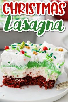 a close up of a piece of cake on a plate with the words christmas lasagna