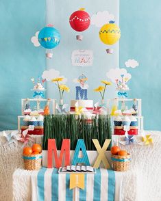 a table topped with lots of food and decorations