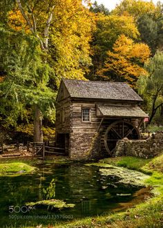 an old water mill in the fall