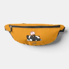 a yellow fanny bag with a black and white dog on it