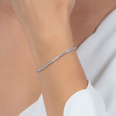 Experience timeless elegance with our Sterling Silver 2mm Fine Tennis Bracelet! Made with high-quality sterling silver, this delicate bracelet is perfect for everyday wear or special occasions. Its 2mm width adds a touch of sophistication to any outfit. Feel confident and stylish with this must-have accessory! 100% Fine Sterling Silver Silver Tennis Bracelet, Gifts For Swimmers, Artisan Gift, Grandmother Gifts, Solid Gold Jewelry, Tennis Bracelet, Gifts For Mum, Feel Confident, Inspirational Gifts