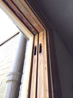 an open window on the side of a building