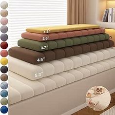 the bedding sheets are stacked on top of each other in different colors and sizes