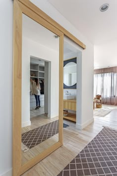 a large mirror in the middle of a room