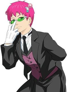 a man with pink hair and green eyes in a black suit, holding his hand to his face