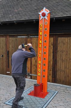 a man taking a photo of a sign