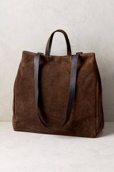 Travel with luxury and utility with the Sutton water-resistant Italian calfskin suede leather large tote bag. Free shipping + returns. Suede Tote Bag, Fox Fur Jacket, Fur Jackets, Suede Tote, Sheepskin Slippers, Market Tote, Fur Coats, Travel Tote, Large Tote Bag