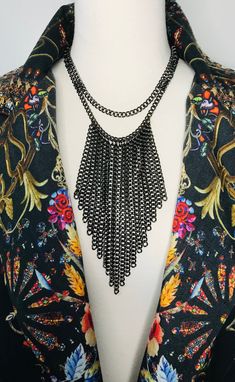 Fabulous Black Waterfall Chain Necklace handmade by me. Love this necklace style!  It's not easy to make as working with chain is so slippery, but the response has been wonderful for this necklace so here is the black chain version.  It's lightweight and falls beautifully on your cleavage. A lovely statement necklace with style. Unique design and perfect for any occasion. ♥️ Overall length 43 cm Always available to answer any questions. Thanks for stopping by.🌸🙏 Handmade Black Chain Necklace For Party, Unique Black Chain Necklace, Black Metal Chain Necklace For Fashion, Bohemian Black Chain Necklace With Adjustable Chain, Black Bohemian Chain Necklace With Adjustable Chain, Black Double Chain Link Necklace, Black Double Chain Metal Necklaces, Black Metal Double Chain Necklaces, Black Metal Necklace With Double Chain