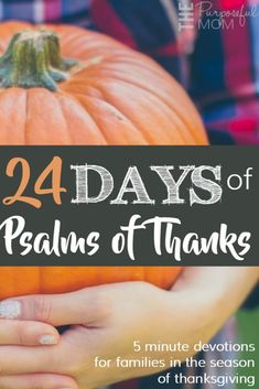 a person holding a pumpkin in their hands with the words, 24 days of peanuts of thanks