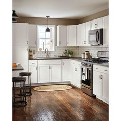 the kitchen is clean and ready for us to use in its new owner's home