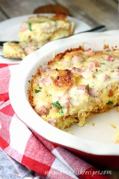 ham and swiss croissant bake on a red and white checkered table cloth