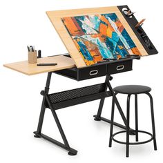 an easel with a painting on it and two stools