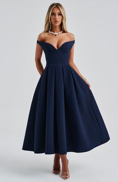 The epitome of elegance, Lanetta features a plunge bardot neckline with elasticated back strap bringing stylish flair. Falling to an effortlessly chic midi length, the design has a full, box pleated skirt and looks amazing paired with pointed heels and soft glam. 



Colour: Navy.

Premium non-stretch crepe.

Fully lined.

Plunge bardot neckline.

Shaped underbust seam.

Full, box pleated skirt.

Elasticated back strap.

Invisible zipper fastening.

Midi length.

 Size: XS, S, M, L, XL, XXL Box Pleat Dress, Box Pleated Skirt, Split Long Dress, Bardot Neckline, Box Pleat Skirt, Loungewear Dresses, Midi Dress Style, Maxi Dress Sale, Soft Glam