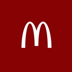 the mcdonald's logo is shown on a dark red background with white outlines