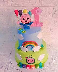 a birthday cake with a cartoon character on top