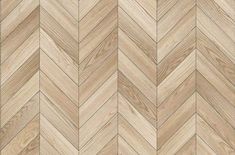 wood flooring with herringle pattern in light brown and white colors, as well as the