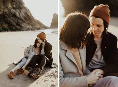 two people sitting on the beach and one is talking on her cell phone