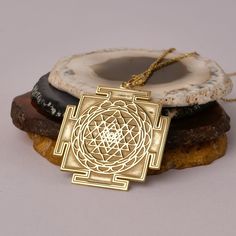 14K Gold Handmade Sri Yantra Necklace - Spiritual Gold Necklace, It can be considered a spiritual gift. Pendant Details 💎 Gold KT: 14K Solid Gold or 8K Solid Gold 💎Gold Color Options: Yellow Gold, White Gold, Rose Gold 💎Thickness: 0.80 mm ✈️ Ready to Ship in 4-7 Business Days ✈️ Transportation is provided by express cargo MORE OF US Pendants and Necklaces: https://goldencastlejewelry.etsy.com NECESSARY INFORMATION 🧡 We provide workshop service in Ankara, we are happy to share our knowledge a Luxury Ceremonial Temple Necklace Pendant, Spiritual Gold Jewelry For Diwali, Spiritual Medallion Jewelry, Temple Jewelry Pendant Necklace As Gift, Spiritual Jewelry With Intricate Design, Spiritual Necklace With Intricate Design For Diwali, Spiritual Necklaces With Intricate Design For Diwali, Symbolic Jewelry For Puja And Festivals, Engraved Temple Jewelry As A Gift