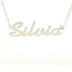 LittleGoldDaisy is a US Company. Silvia - Sterling Silver personalized Name Necklace on beautiful Italian 16" Trace Chain. Personalized in script font style with name - Silvia -.  Comes complete with superior Mirror Polish and in presentable gift box. Description: Sterling Silver 925 (solid not plated) Personalized Name Necklace Name: Silvia Thickness: 1mm solid Silver Chain Type: Rolo/Trace Chain in Sterling Silver Chain length: 16 inches For ANY Personalized / Customized Name other then this l Walking Red Flag, Popular Script Fonts, Name Plate Necklace, Necklace Pendent, Necklace Name, Plate Necklace, Pendent Necklace, Red Flag, Font Style