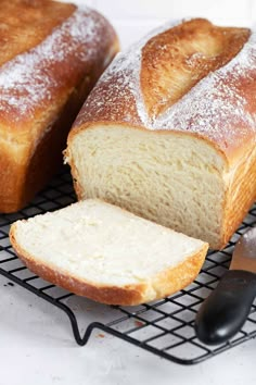 a loaf of bread sitting on top of a cooling rack