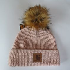 Custom Hat: Carhartt Cherry Blossom Beanie Altered With The Addition Of A Handmade In The Usa Premium Lynx Faux Fur Pom We Make By Hand All Of Our Poms Here In The Us Listing Crossposted On Ebay 100% Acrylic Rib-Knit Partial Fleece Lining For Warmth Cardigan Stitch Pattern Leatherette Carhartt Patch Sewn On Front Casual Pink Beanie One Size, Trendy Adjustable Pink Beanie, Trendy Pink Beanie, Casual Warm Pink Beanie, Pink Casual Beanie Cap, Pink Outdoor Beanie Cap, Pink Casual Beanie For Fall, Casual Pink Beanie For Fall, Pink Beanie For Outdoor