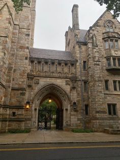 an old stone building with a clock tower