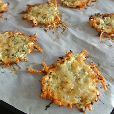 cheesy crackers on a baking sheet ready to be baked in the oven