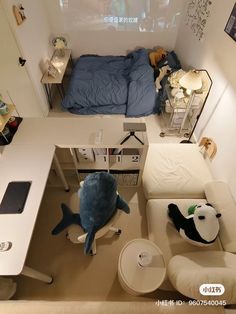 an overhead view of a small bedroom with stuffed animals