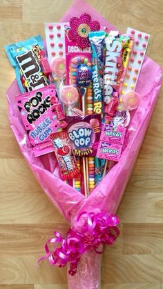 a pink bag filled with lots of candy