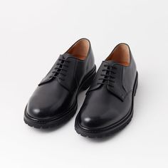 Black Leather Round Toe Derby Shoes | COSIMO | JOSEPHT.CA Black Leather Sole Lace-up Shoes For Business Casual, Black Oxfords With Vibram Sole For Office, Formal Black Leather Shoes With Vibram Sole, Black Oxfords With Vibram Sole For Business, Black Leather Shoes With Vibram Sole For Formal Occasions, Black Modern Leather Shoes With Rubber Sole, Modern Black Leather Shoes With Rubber Sole, Modern Formal Oxfords With Vibram Sole, Black Oxfords With Rubber Sole For Derby