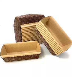 there are many boxes that have been made out of brown paper and lined with cardboard