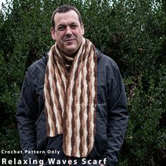 a man standing in front of some bushes wearing a scarf with the words crochet pattern only relaxing waves scarf