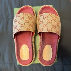 New Never Worn In Great Condition. Luxury Red Slip-on Sandals, Gucci Cushioned Sandals, Designer Slip-on Sandals With Red Sole, Designer Brown Slides, Gucci Sandals With Branded Heel Counter For Beach, Gucci Designer Sandals With Red Sole, Gucci Brown Slip-on Sandals, Gucci Red Open Toe Sandals, Gucci Sandals For The Beach