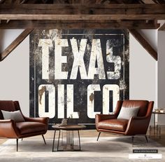 two chairs and a table in front of a wall with the words texas oil on it