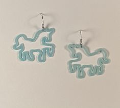 These blue unicorn earrings are made out of real Silly Bandz. They are no others like them. These cute earrings are a perfect for a Christmas or birthday gift for that special person in your life. They'd look great on you, too! I really enjoyed making these, and I hope you like them as much as I do! If you have any questions please feel free to contact me! Silly Earrings, Blue Unicorn, Unicorn Earrings, Quirky Jewelry, Fun Earrings, Special Person, Cute Earrings, I Hope You, Jewelry Earrings Dangle