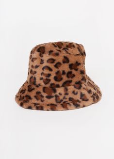 The revival of '90s fashion continues this Fall with the resurgence of fluffy bucket hats. Step into the bold look wearing our faux fur style imprinted with leopard spots. Leopard Bucket Hat, Fluffy Bucket Hat, Fall Fashion Accessories, Fur Bucket, Faux Fur Bucket Hat, Fur Bucket Hat, Faux Fur Hat, Brown Leopard, Fur Fashion