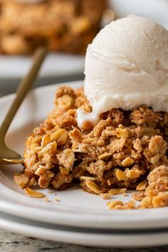 an ice cream sundae on a white plate