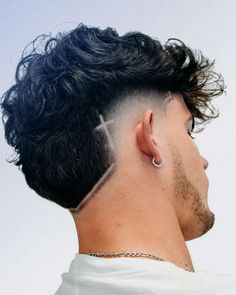 40 Burst Fade Mullet Hairstyles That Redefine Cool - WiseBarber.com Fade Haircut Line Design, Burst Fade With Cross Design, Mens Burst Fade Haircut Short, Hair Lining For Men, Fade Lines Haircut, Men Haircut With Design, Burst Fade Mohawk With Design, Line In Haircut Men, Hair Line Designs For Men