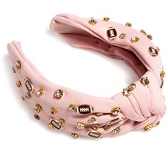 Add a feminine touch to your sports apparel with Shiraleah’s Game Day Charms Knotted Headband. With its chic blush fabric background, the adorable rhinestones and football charms pop to show off your sporty spirit! This subtle accessory is sure to get the fans going at your next gameday celebration. Pair with other items from Shiraleah’s Gameday Collection to complete your look! Blush Fabric, Plaid Headband, Pink Games, Fabric Background, Accessories Display, Knotted Headband, Hair Accessories Gift, Girls Sweet, Baby Sneakers