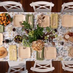 an overhead view of a table set with place settings