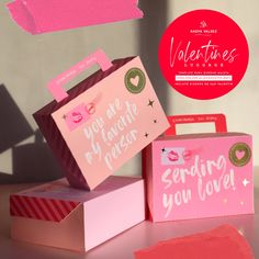 valentine's day greeting cards and gift boxes on a table