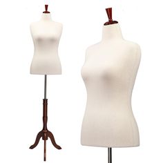 two mannequins are standing next to each other on wooden stands, one is white and the other is brown