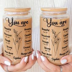 two women holding jars with different types of things in them and the words you are amazing written on each jar