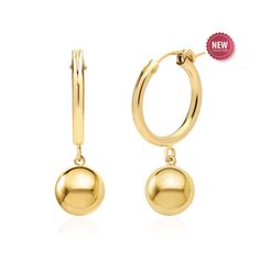 Our classic gold hoop earrings just got a little makeover. Crafted in lustrous and polished 14K gold-filled metal featuring 19 mm (3/4 inch) wide and 2.3 mm thick hoops ending in 8 mm ball drops. Secure and comfortable latch back closure. Perfect gift for Mothers Day or graduation gift.  If you would like the same pair of earrings to be made with smaller hoops, please contact us via Etsy Conversations. PRODUCT INFORMATION -  METAL: 14K Gold Filled  -  LENGTH - 1.1 Inch / 28 mm -  WIDTH - 0.75 In Usa Jewelry, Gift For Mothers Day, 1st Anniversary Gifts, Cary Nc, Gold Filled Hoops, Hoop Earrings Gold, 1st Anniversary, Classic Gold, Gold Filled Jewelry